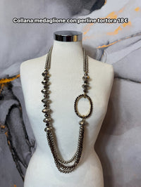 Collana medaglione con perline