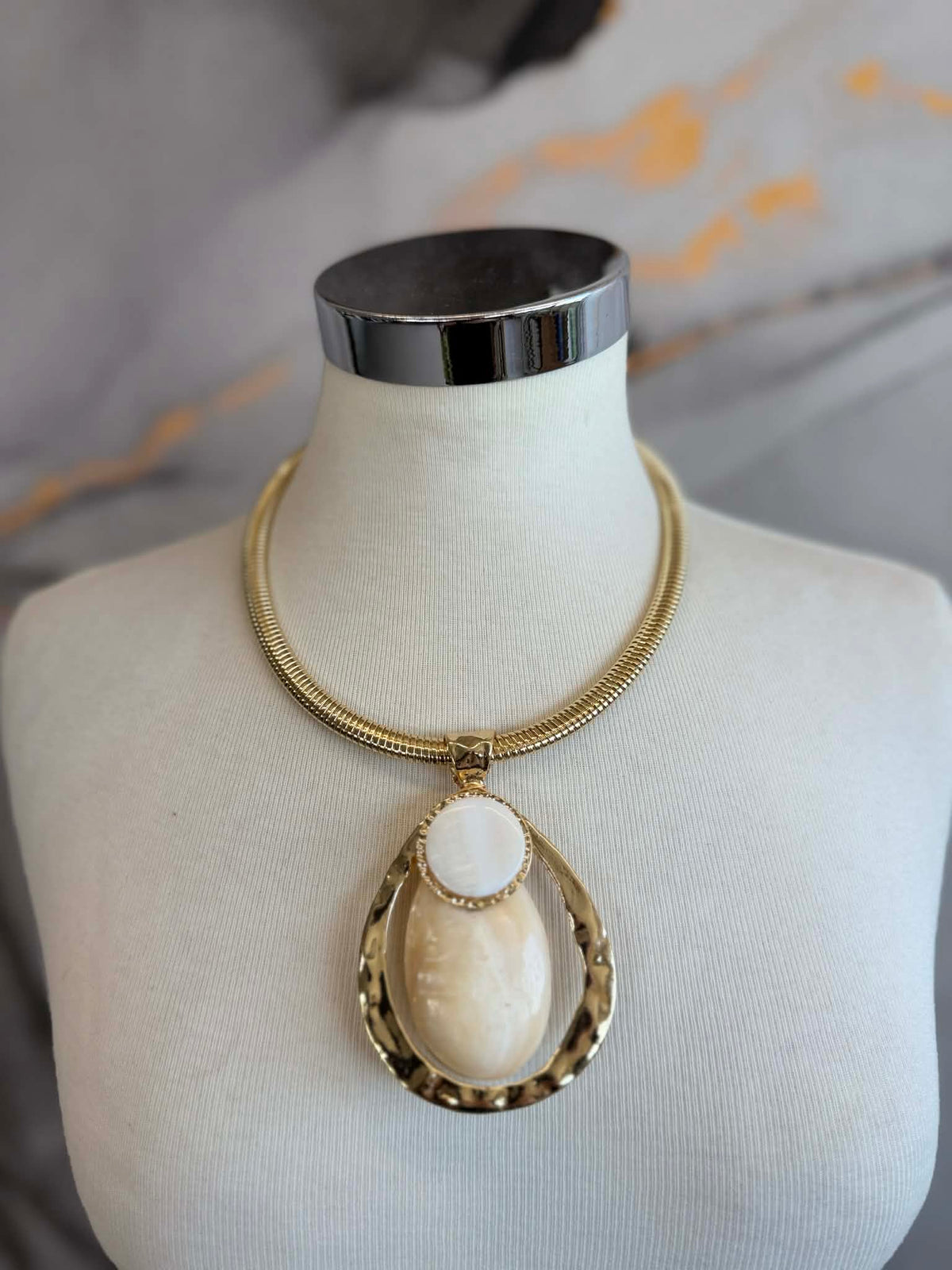 Gold locket necklace with pearl