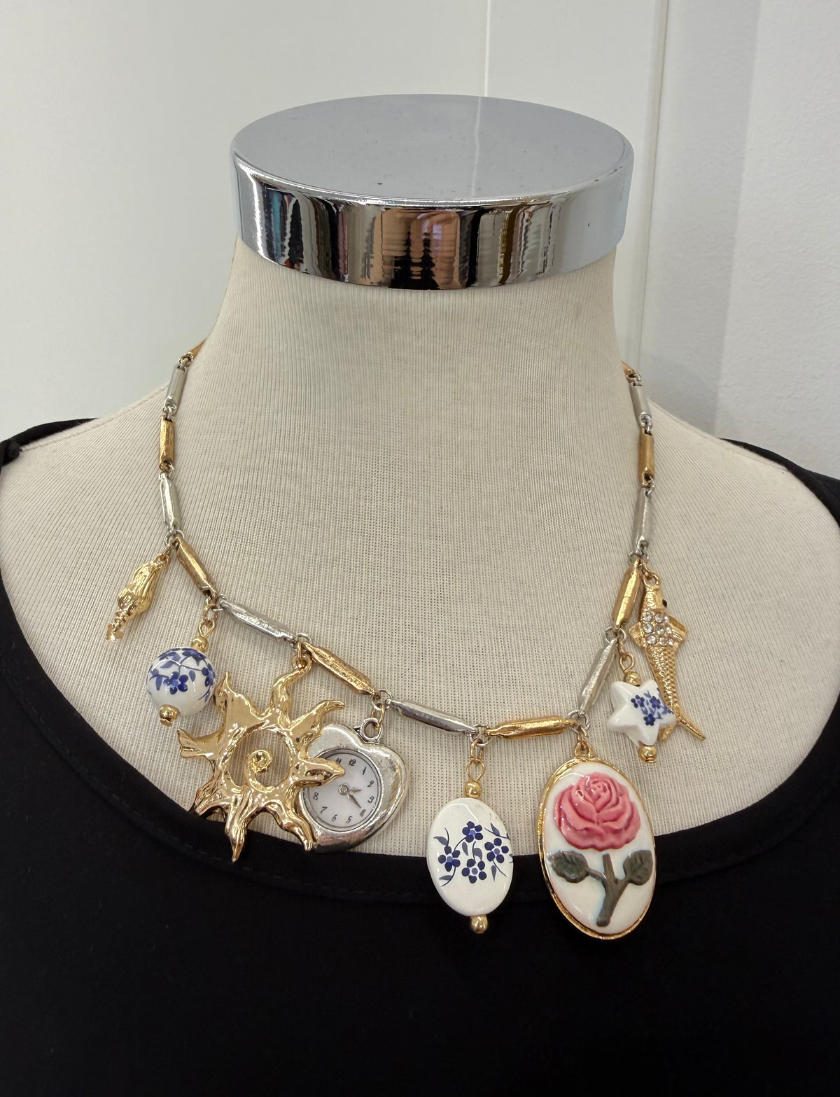 Collana orologio con sole oro