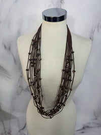 Collana fili con perline luminose