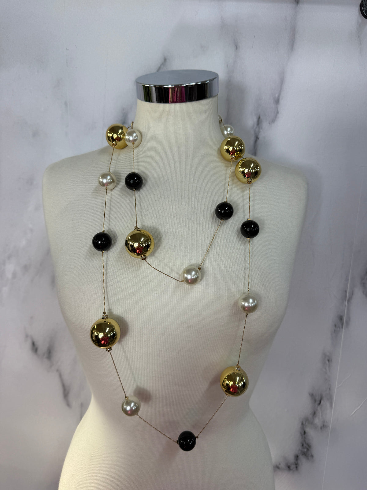 Collana lunga sfere nero, oro e argento