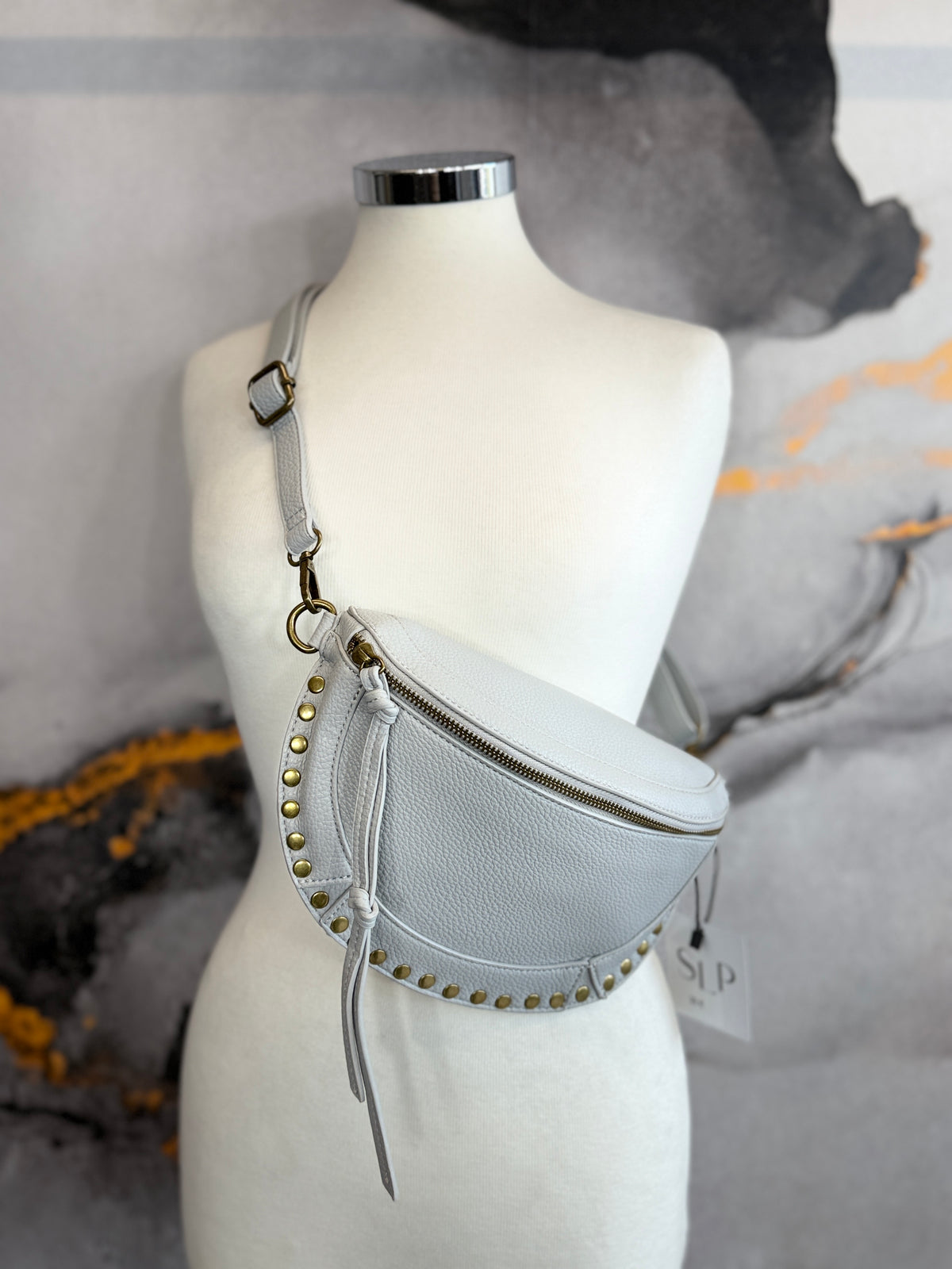 Faux leather fanny pack with gold studs