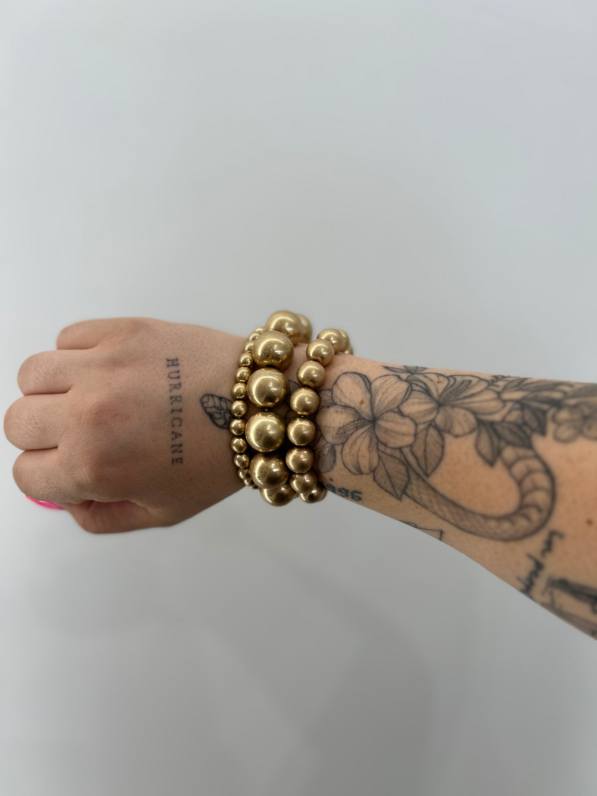 Bracciale fili perle oro elasticizzato