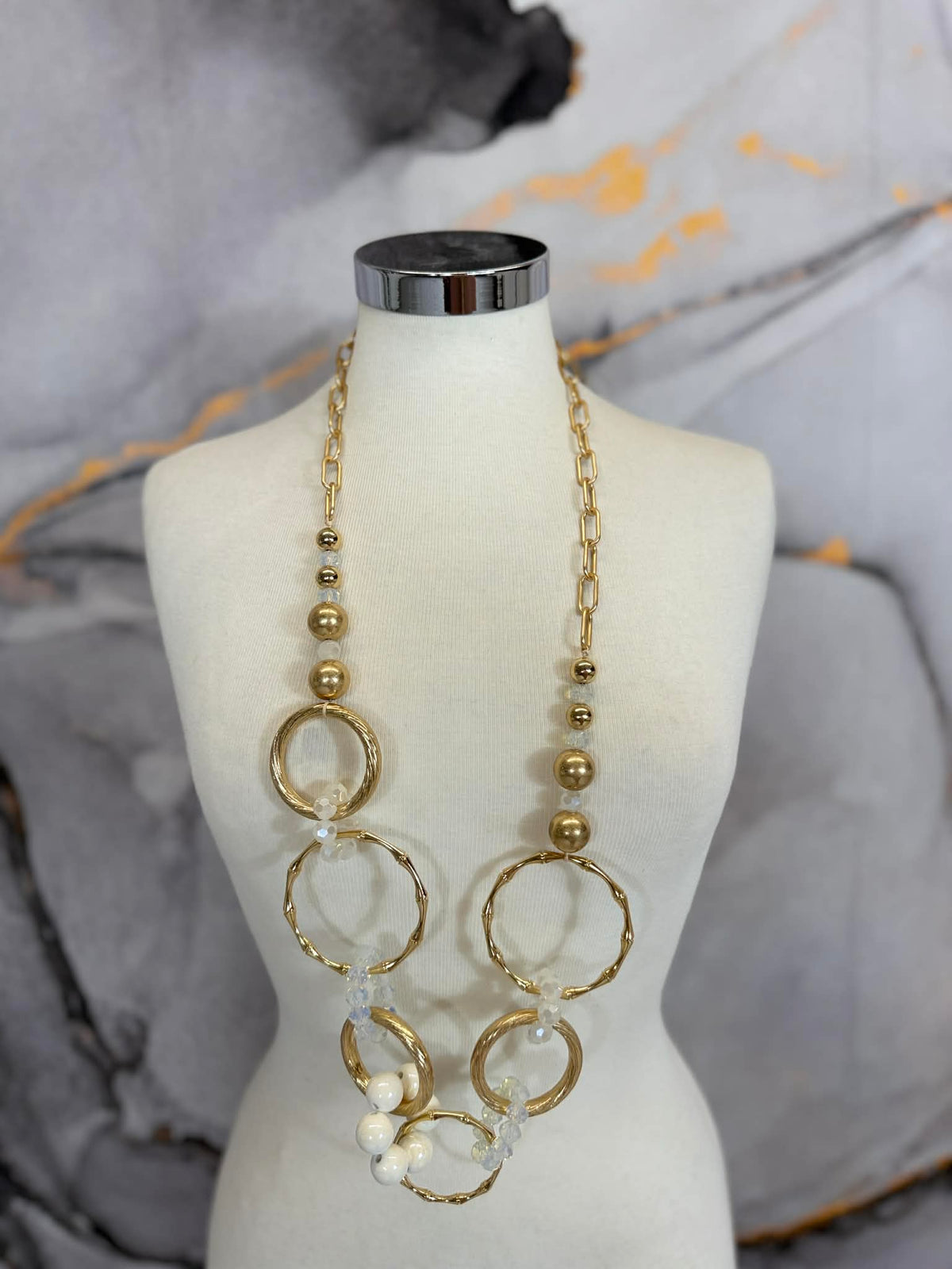 Gold circle necklace with beads