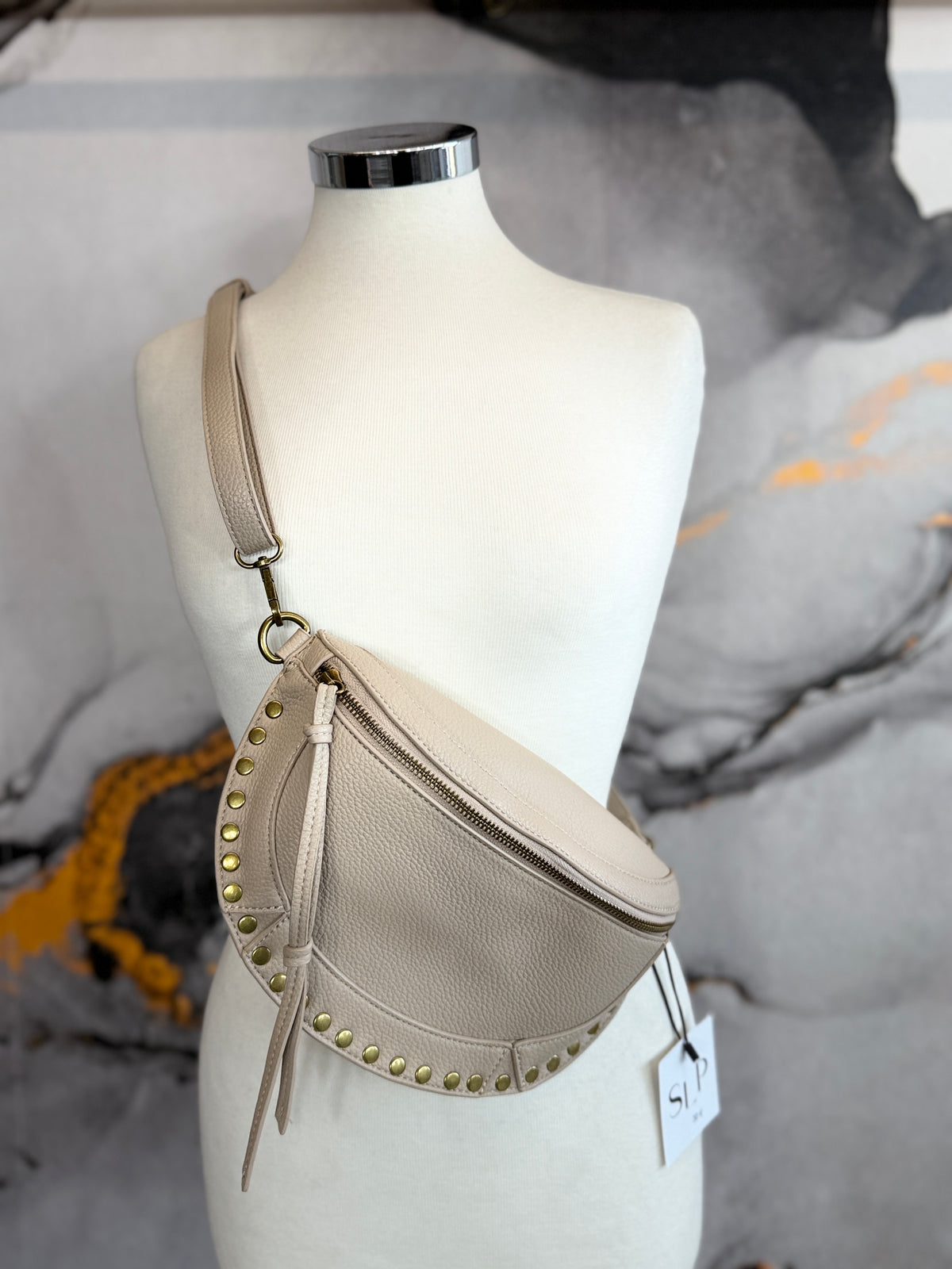 Faux leather fanny pack with gold studs