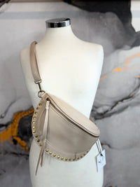Faux leather fanny pack with gold studs