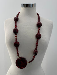 Collana perline con medaglione