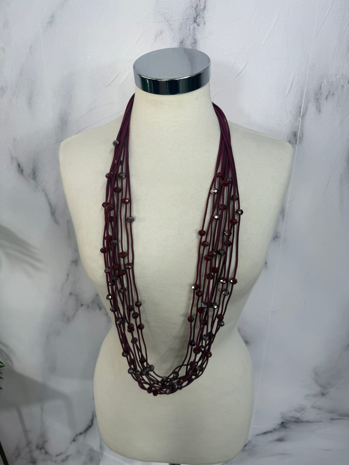 Collana fili con perline luminose