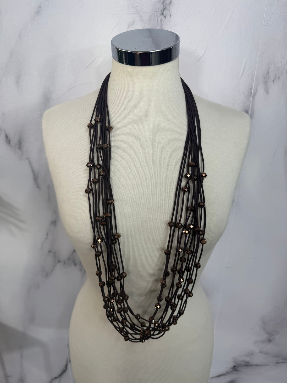 Collana fili con perline luminose