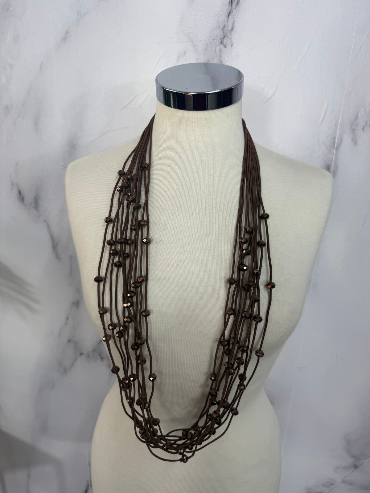 Collana fili con perline luminose