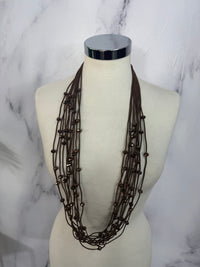 Collana fili con perline luminose