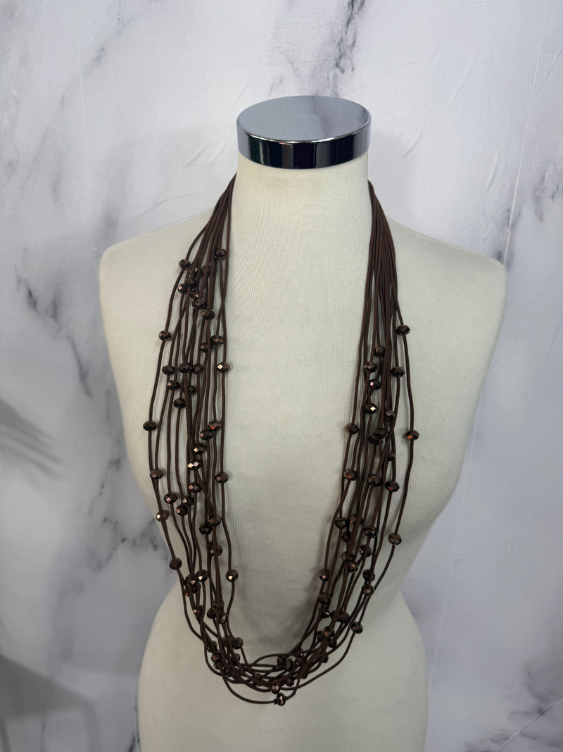 Collana fili con perline luminose