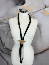 Rubber strand necklace with triangle