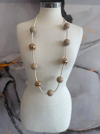 Gold sphere necklace