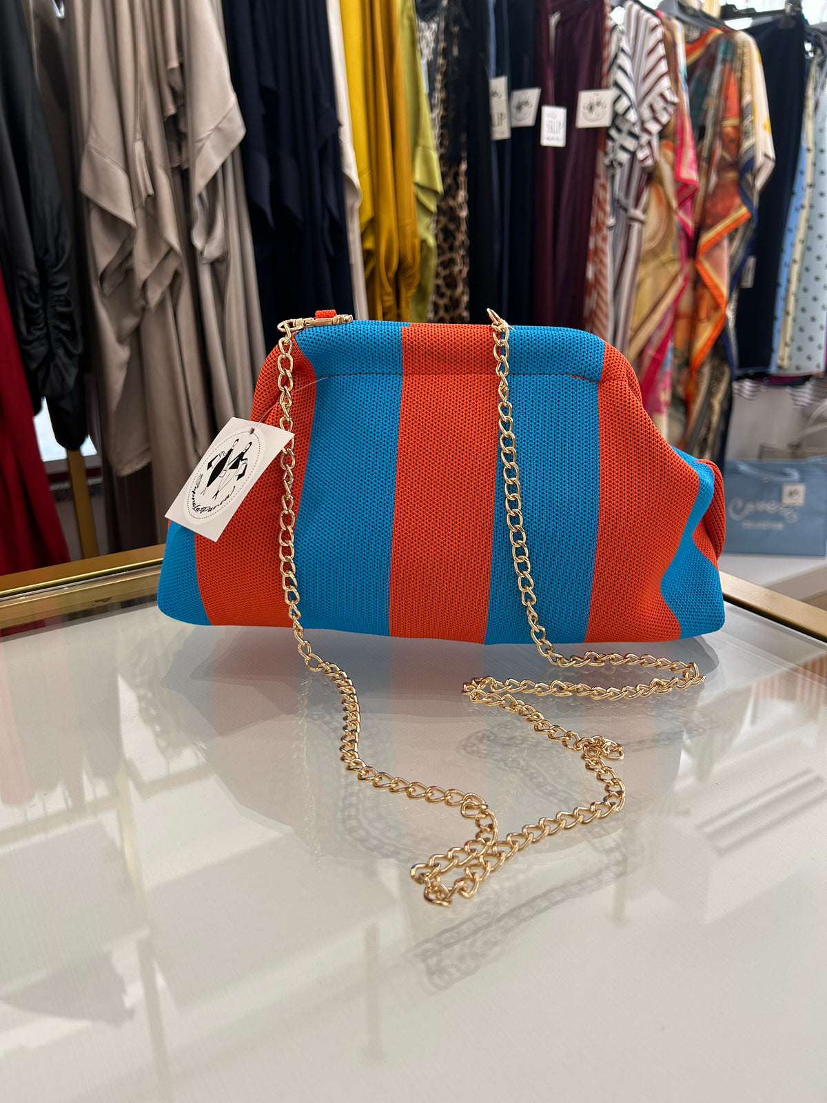 Pochette a righe con tracolla