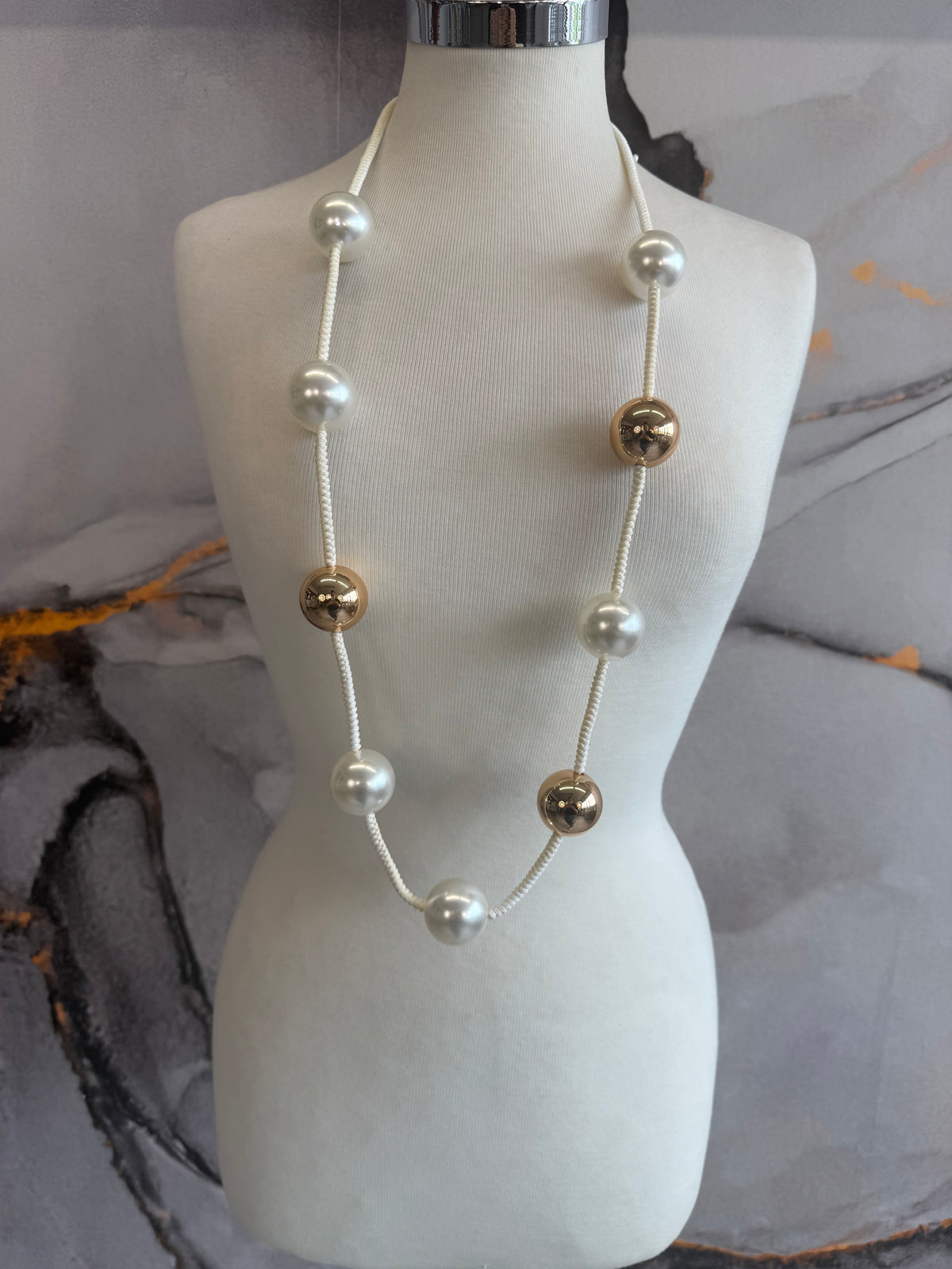Gold sphere necklace