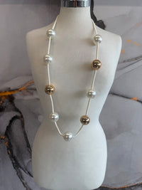 Gold sphere necklace