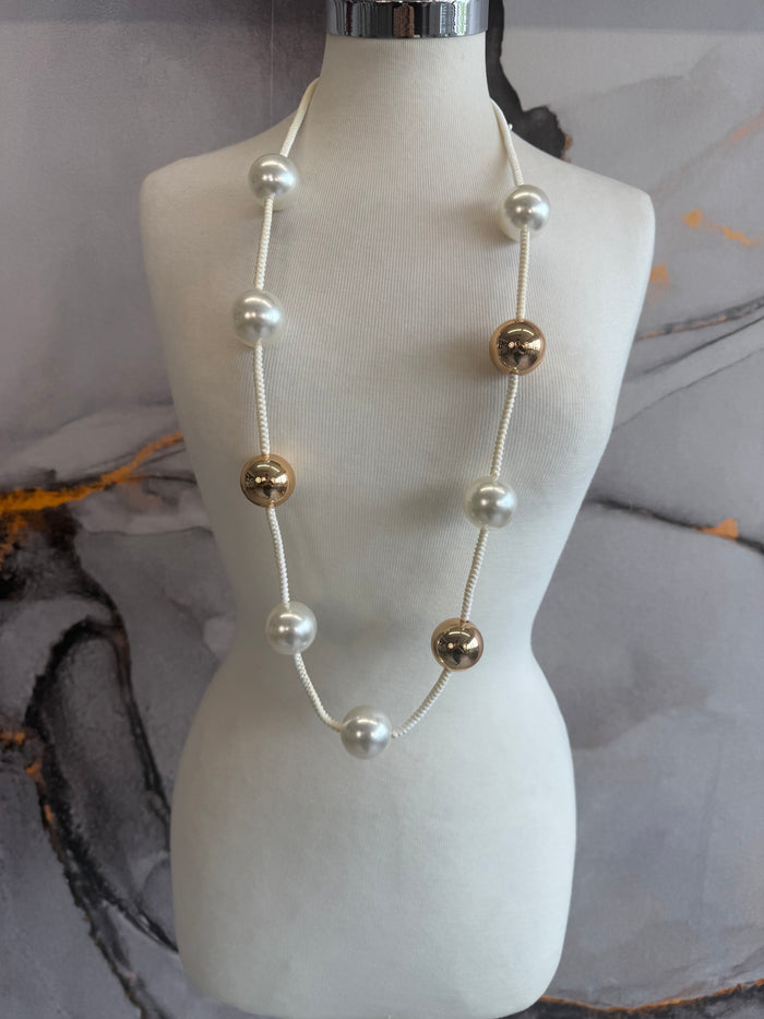 Gold sphere necklace