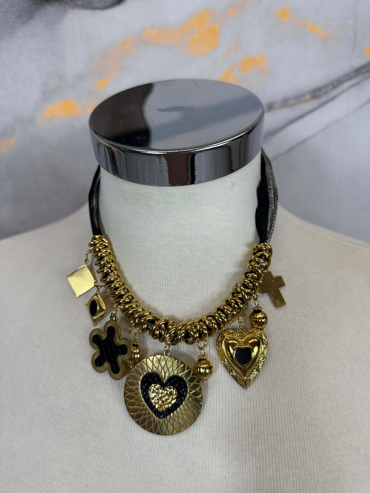 Short gold pendant necklace with heart